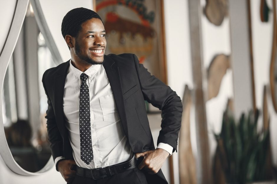 A confident, well-groomed man with a straight smile